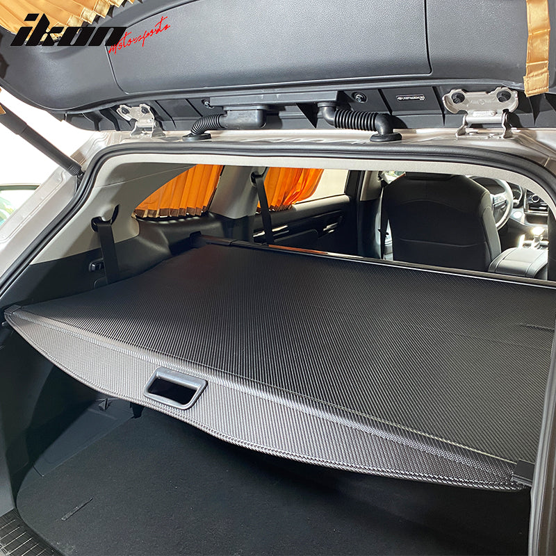 IKON MOTORSPORTS, Rear Cargo Cover Compatible With 2020-2024 Toyota Highlander, Retractable Rear Trunk Security Cargo Cover Luggage Shade Black PVC & ABS & Aluminum CF Texture Style, 2021