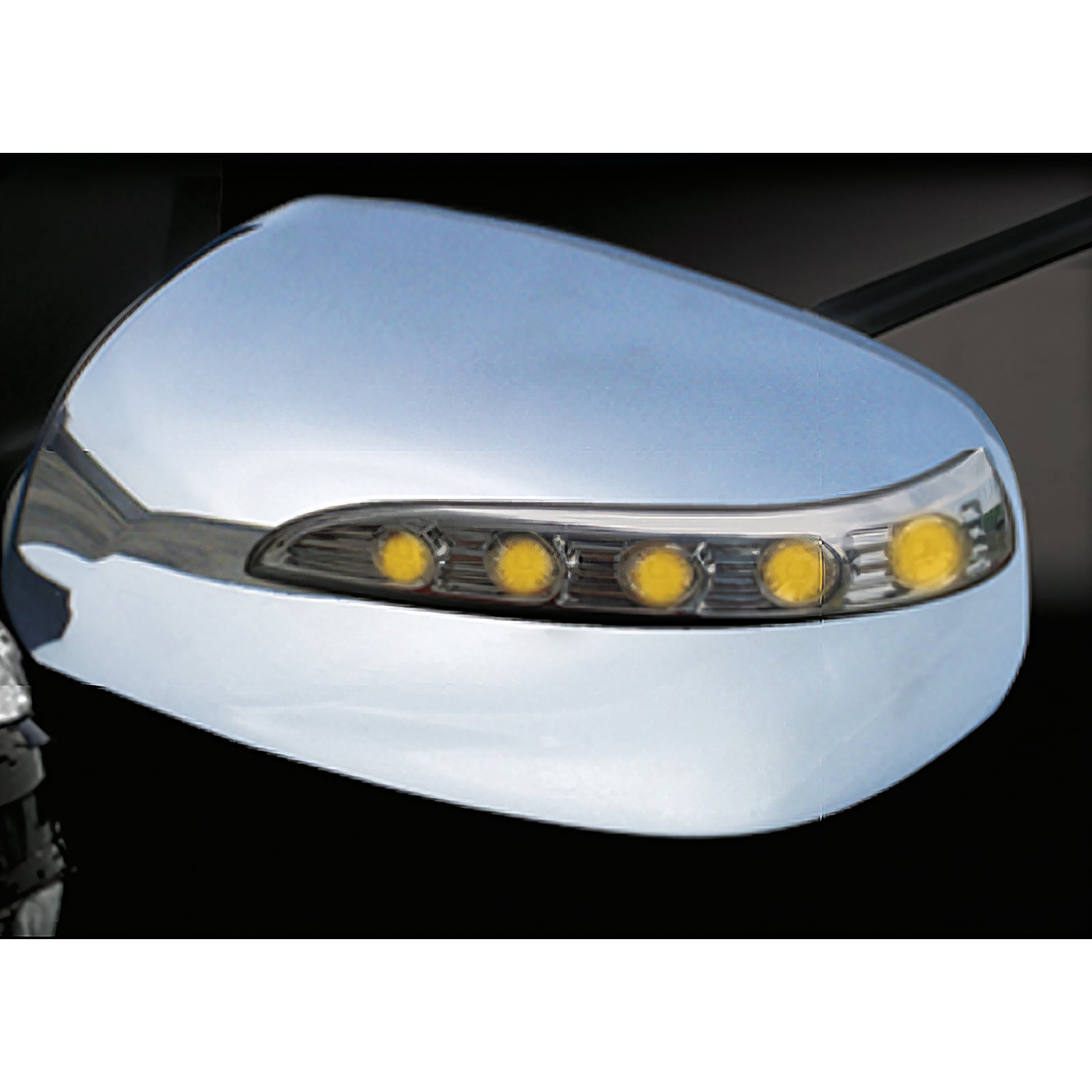 Chrome car side mirror with LED indicators on a black background